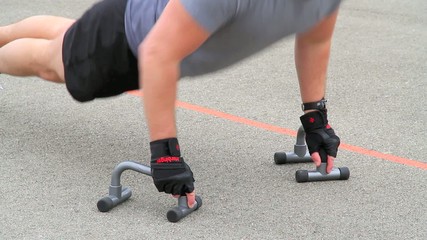 Young man doing push up