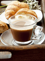 Cappuccino in Transparent Cup and Croissants