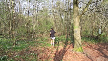 Man running in the forrest 