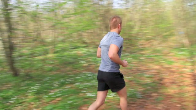 Man running in the forrest