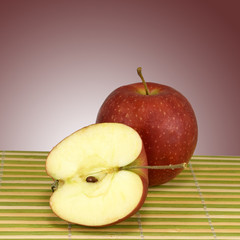 image of apple on a striped surface