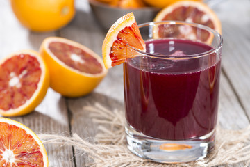 Fototapeta na wymiar Glass with Blood Orange Juice