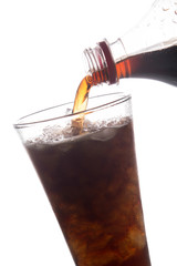 Cola pour into glass ice on white.