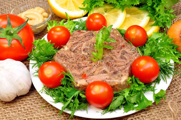 jellied meat with fresh herbs and cherry tomatoes