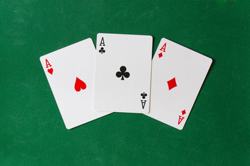 Three Ace background on the green background