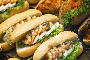 Various sandwiches on a shop counter