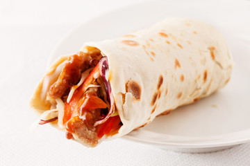 tortilla fajita wraps with meat and vegetables
