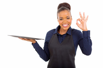 young african american waitress giving ok hand sign