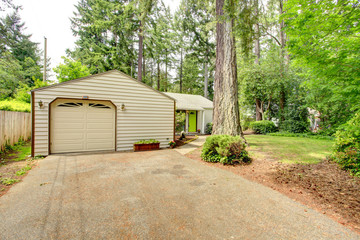 Countryside house. Garage with driveway