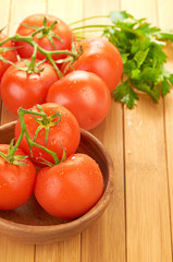 tomatoes in wooden bowlin