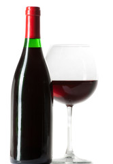 Wine bottle and a glass filled with wine isolated on white