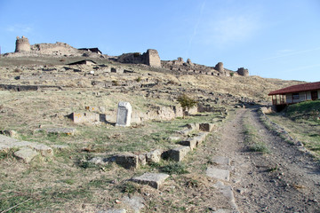 Dirt road and ruins