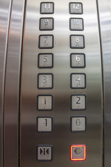 Buttons in elevator, one to twelve