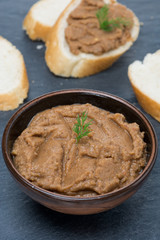 pate of chicken liver and roasted peppers in a bowl, vertical