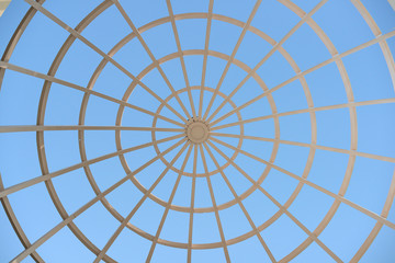 Roof top web on isolated blue sky