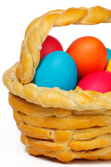 Baked basket with Easter colored eggs