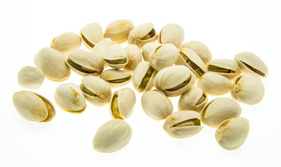 Some pistachios isolated on white background