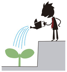 大きな芽を育てるビジネスマン