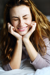 Portrait of charming beautiful girl bed