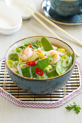 Asian soup with shrimp and vegetables.
