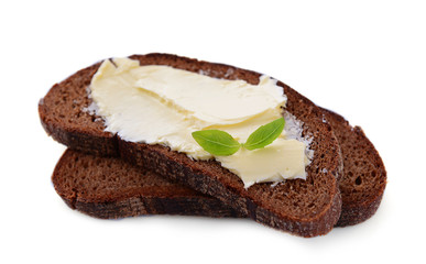 Slices of rye bread with butter, isolated on white