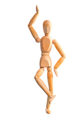 wood mannequin holds the balance on one leg