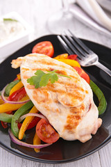 grilled chicken breast and vegetables