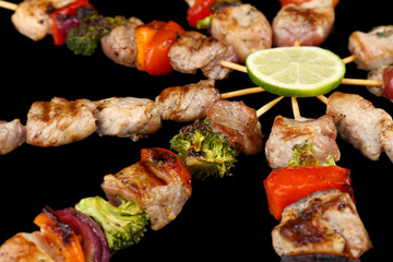 Pork kebab on black background