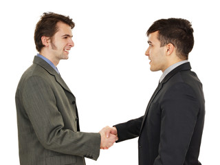 Potrait of young business people shaking hands