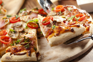 Pizza with ham and mushrooms