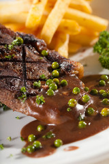 steak, a piece of beef steak with pepper sauce