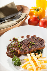 steak, a piece of beef steak with pepper sauce