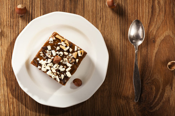 cheesecake with nuts on plate
