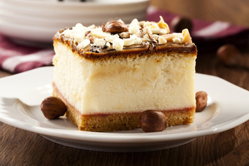 cheesecake with nuts on plate