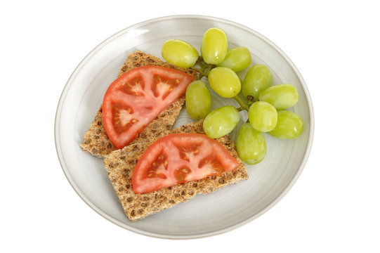 Rye Crispbread Crackers with Tomatoes and Grapes