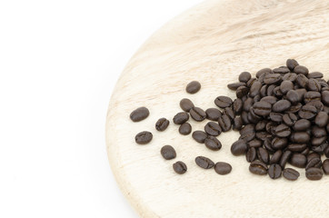 Coffee beans and kitchenware made ​​of wood isolated on white
