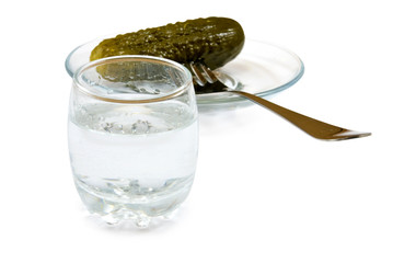 glasses with vodka and pickled cucumber