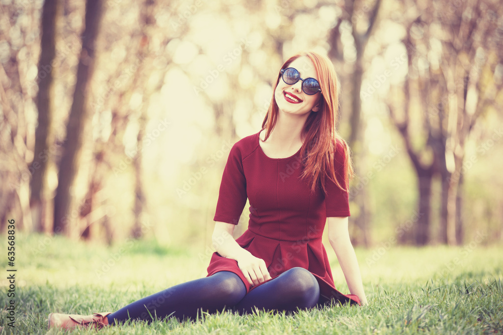 Sticker redhead women in a park