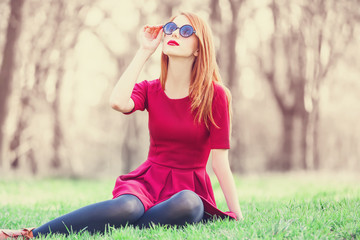 Redhead women  in a park