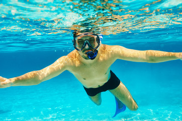 Man with mask snorkeling