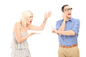 Fototapeta premium Angry woman yelling at her boyfriend