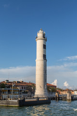 White Stone Lighthouse in Murano Under Blue Sky