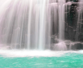 part of a waterfall taken with a slow shutter speed to smooth th