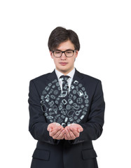 Man holding hologram globe consisting of social media icons.