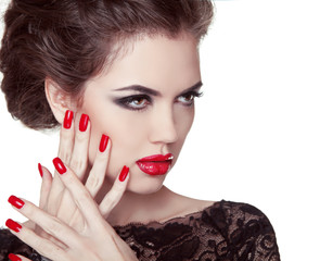 Nails closeup. Manicure and Makeup. Retro woman with red lips. M