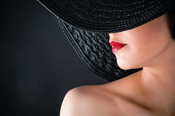 fashionable glamorous woman in hat closeup
