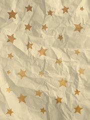 Wrapping paper with doodle stars on crumpled paper texture