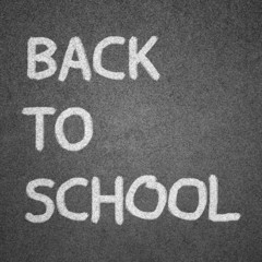 Fototapeta premium back to school text written on blackboard for background