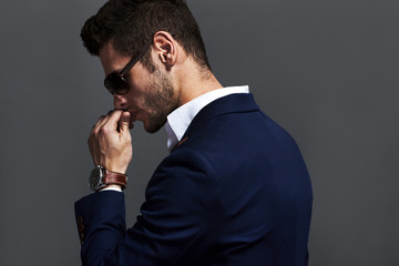 Handsome man wearing glasses and watchers