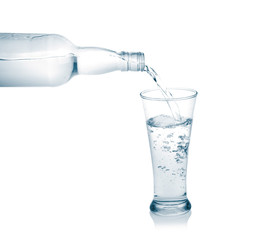 Pour into a glass isolated on a white background.
